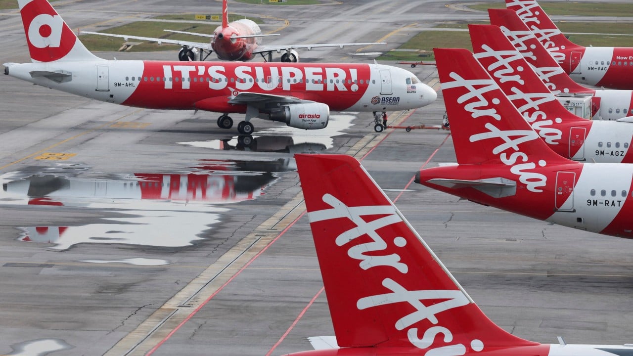AirAsia to launch new airline, flying against wind of high oil costs